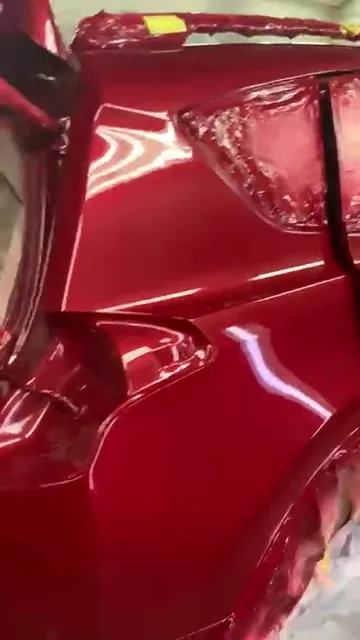 Walk around the Toyota RAV4 in fresh gloss red paint inside the spray booth