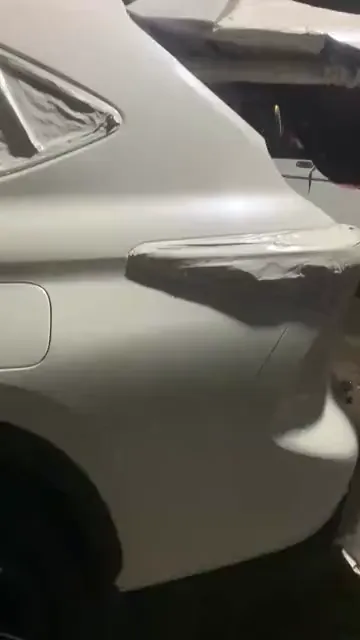 Walk around an SUV in a fresh pearl white coat with the trim masked